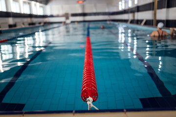 lane divider in the pool. swimming pool with clean water for athletes training