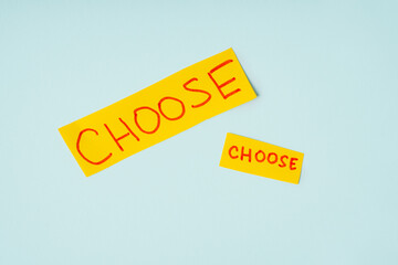 CHOOSE label on yellow paper, the concept of choice and solutions