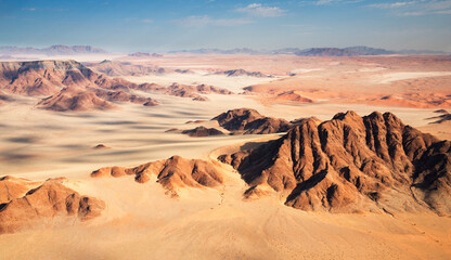Fototapeta na wymiar aerial view to beautiful sand desert Namib full of dunes, shapes, patterns