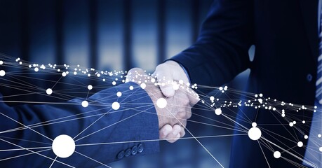 Composition of businessmen shaking hands with network of connections