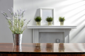 Wooden old table in the house and the rays of the spring day sun 