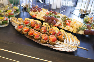 canapes with salmon, cheese and vegetables
