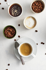 Assorted coffee, coffee beans, copy space, top view.