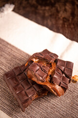 Broken assorted chocolate bar with caramel filling. Gluten free. Gourmet. 