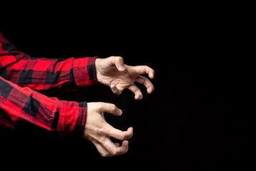 Crooked male hands, reaching for something. Emotions, stress, epilepsy, or other neurological disease.