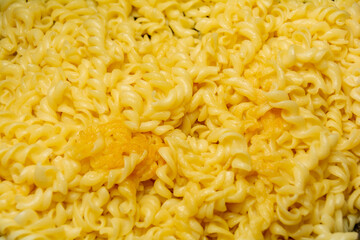 Boiled and cooked pasta, Italian food. Abstract background from cooked pasta.