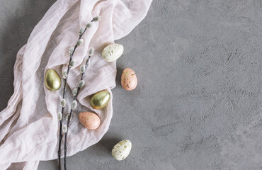 Easter background with eggs and spring willow branches.