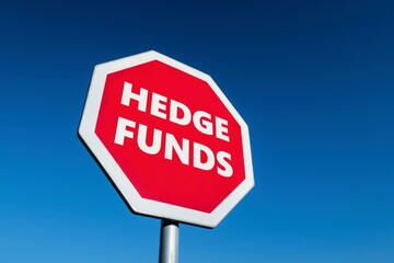 Stop traffic sign with Hedge Funds text in order to be better than professional on futures market