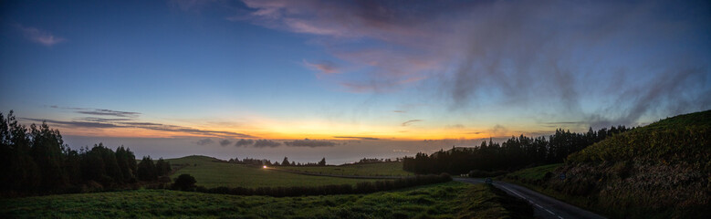 Naklejka na ściany i meble Panorama during sunset at Sao Miguel island, Azores travel destination.
