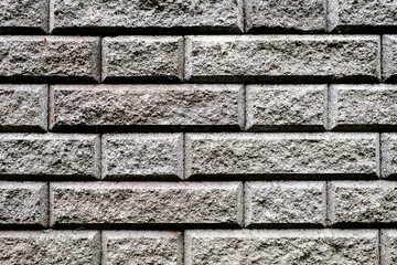Light background of urban houce brick stone wall. texture