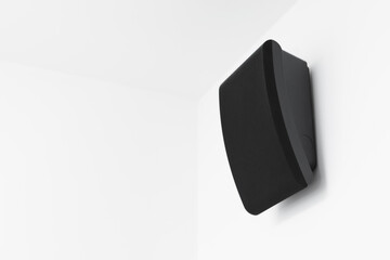 intercom speaker mounted on white wall in a hotel room - Powered by Adobe