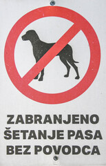 Sign, warning forbidden to walk dogs without leash
Zabranjeno šetanje pasa bez povodca