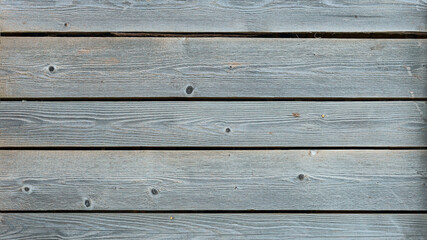 Obraz premium old wooden Board with a beautiful texture and knots as background