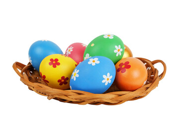Colorful painted Easter eggs in the basket on the white background, isolated