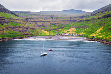 Aerial drone photo flying over Tjornuvik beach on Streymoy island, Faroe Islands, Denmark. Landscape photography