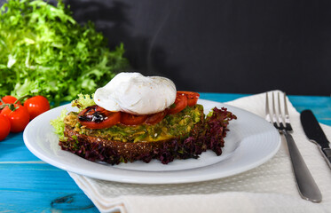 Poached eggs with herbs and vegetables