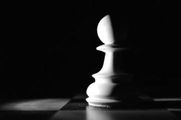 chess pieces illuminated in the dark