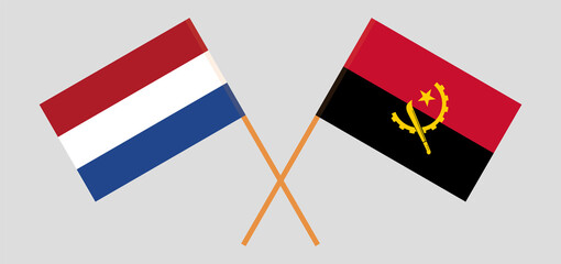 Crossed flags of the Netherlands and Angola. Official colors. Correct proportion