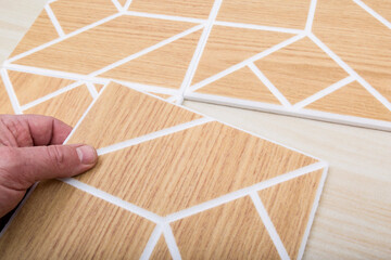 Installation of acoustic panels on walls and ceilings
