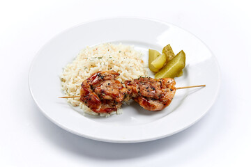 pork kebab with rice on the white plate