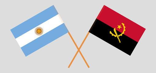 Crossed flags of Argentina and Angola. Official colors. Correct proportion