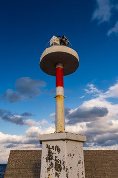 Red Lighthouse On The Left Side Of Every Port Entrance.