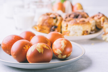 Natural  dyed Easter eggs  with onion shells and springtime  plants