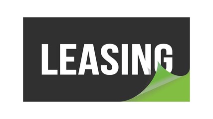 LEASING text written on black green sticker.