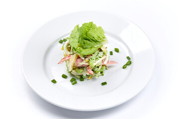fresh vegetarian salad on the white plate