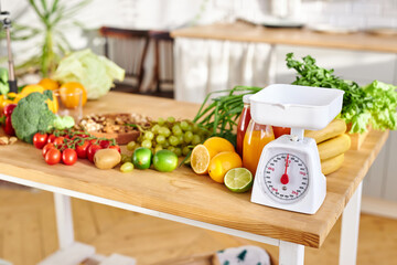 organic food and scales on table, detox diet for health care, copy space