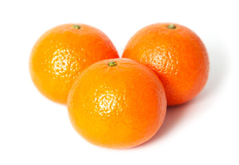 Three oranges isolated on white
