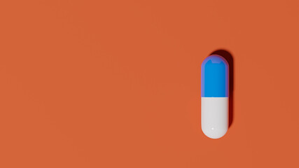 Blue and white capsule on orange background. 3D rendering