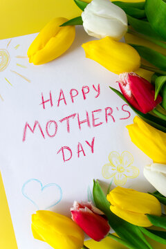 Greeting card for Mom drawn by child on Mother's Day with the inscription "Happy mother's day" with colorful tulips in bouquet of flowers on yellow background.