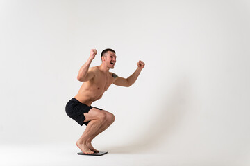 Fototapeta premium Man happy with weights health pondered, health and sports on a white background pain sore painful, backache spine caucasian stress, muscular chronic. Hold lumbar care, back suffer attractive