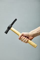 hammer in flat style. Typical simplistic hammer tool isolated on gray background