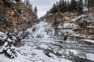 Fototapeta na wymiar Beautiful Cameron Falls in Waterton, Frozen in Winte