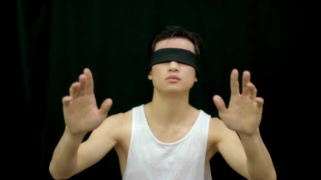 Asian man blindfolded. Hallucination mind confusion korean. Chinese sectarian meditation blindfold. Asia extrasensory occultism. Disability visual impairment. Cult blind people. Hypnotic illusion sect