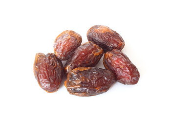 Dates on a white background. Dried fruits. Dried dates lie next to each other