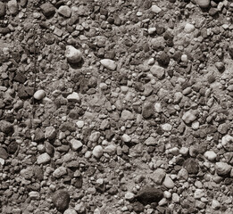 black and white photo of stone wall background, textured