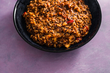 vegan quinoa with Mediterranean veggies and red pesto, healthy plant-based food recipes