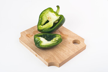 chopped green peppers on a cutting board