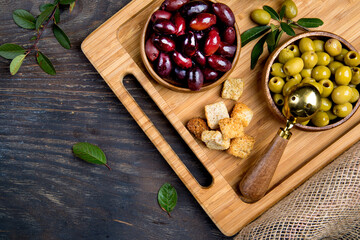 Olive oil and green olives shot from above