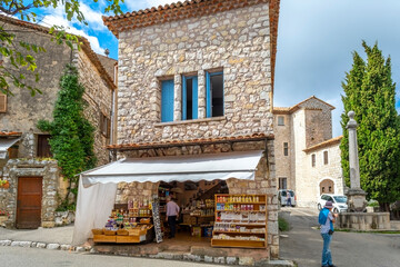 Fototapeta premium A small souvenir gift shop near the castle of the walled medieval village of Gourdon, France, in the Provence Alpes-Maritimes area.