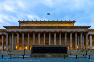 St George's Hall in Liverpool lights up yellow to celebrate National Day of Reflection