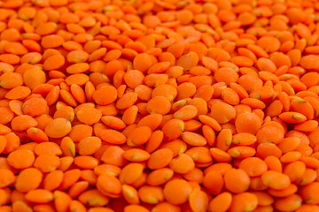Full frame of red lentils.