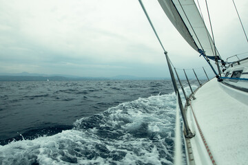 Sailing yachts in the Aegean sea in stormy weather. Yachting.