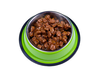 Canned food for cats or dogs in metal green bowl isolated on white background