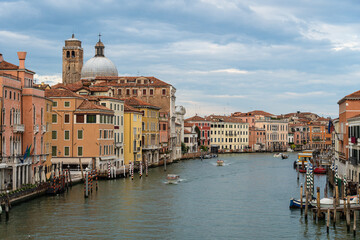 Fototapeta na wymiar Dramatic view of the famous Grand Canal in Venice, Itlay, on a cloudy day