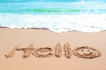 Hello summer written on the beach. Can be use for Summer background