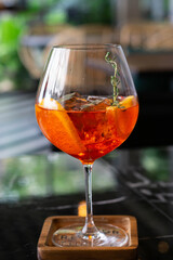 glass of aperol spritz cocktail